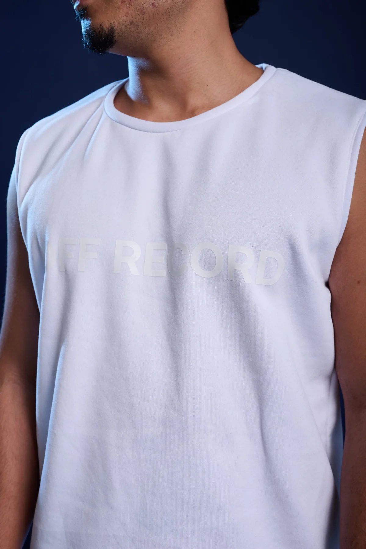 boxy off-white sleeveless t-shirt