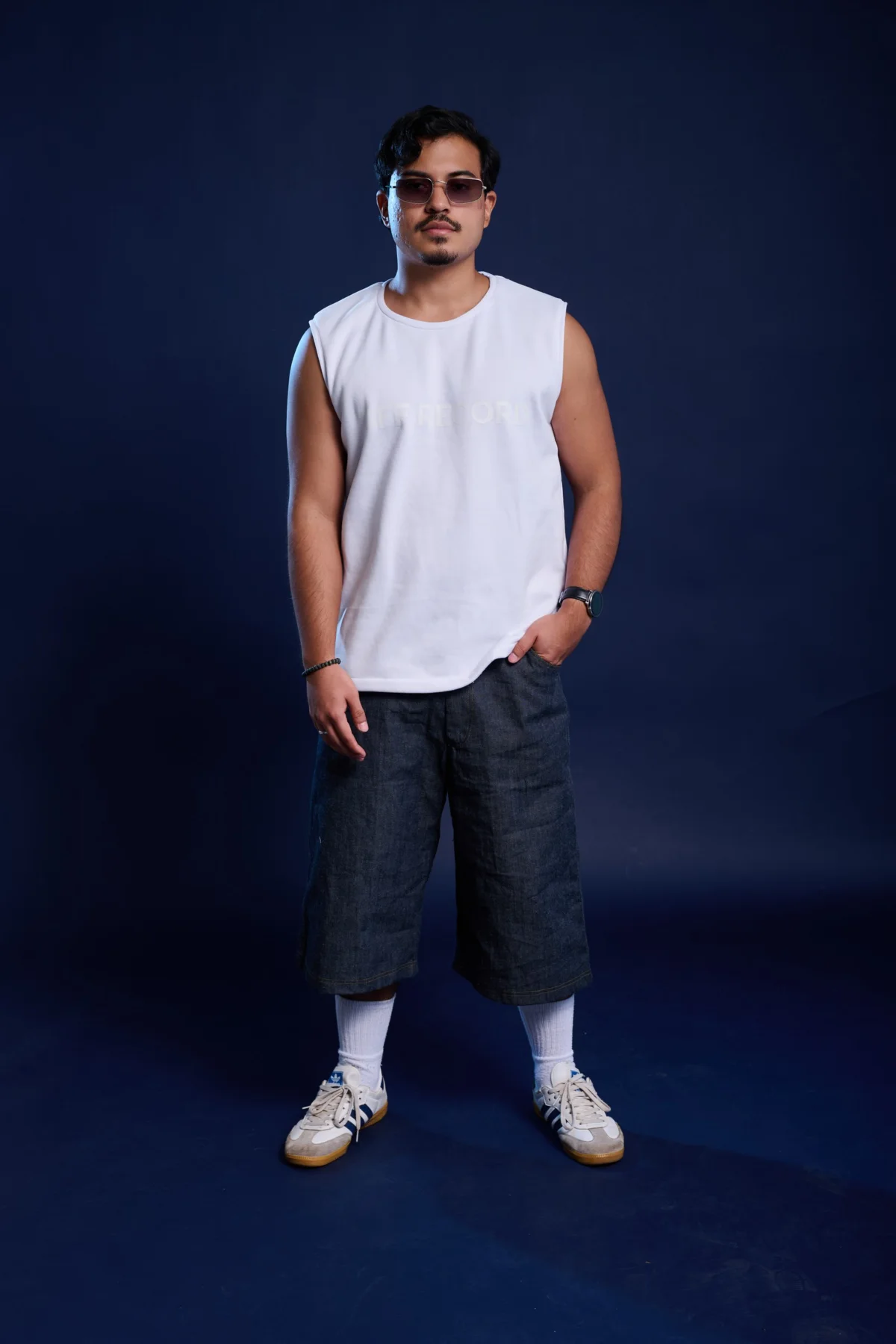 boxy off-white sleeveless t-shirt