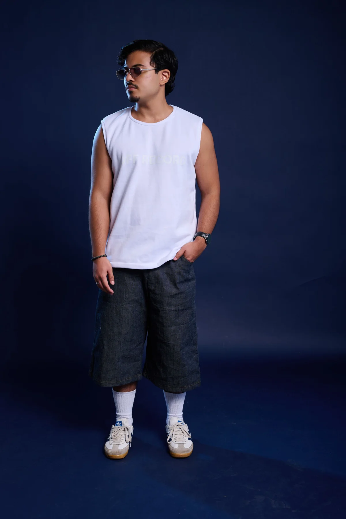 boxy off-white sleeveless t-shirt