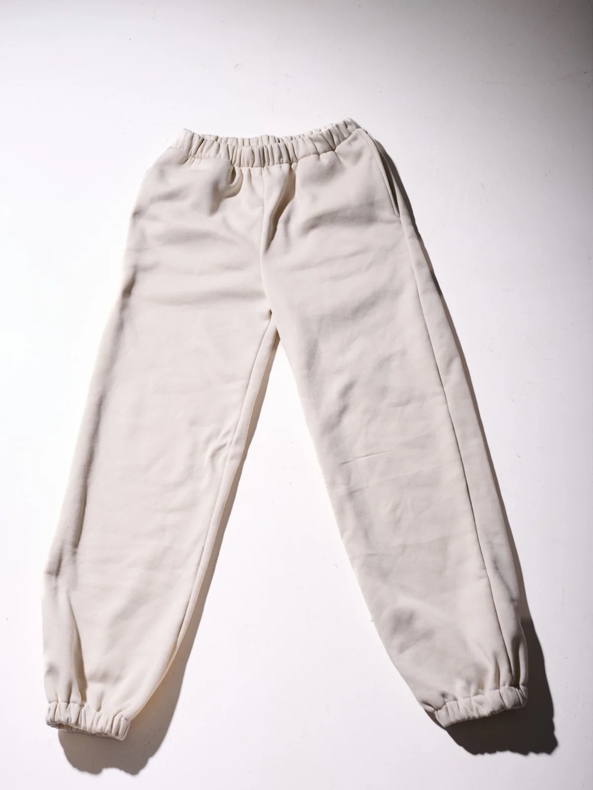 cream sweatpants
